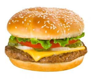 A classic cheeseburger with a 100% beef patty, melted cheddar cheese, lettuce, tomato, onions, and pickles on a sesame seed bun.