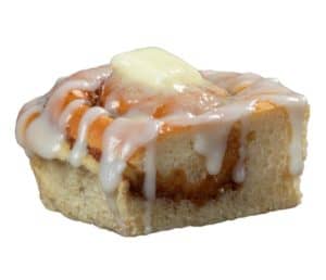 Soft cinnamon roll topped with sweet icing and a buttery glaze.