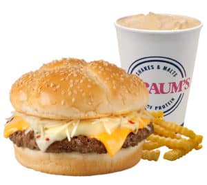 Braum’s Four Cheeseburger Combo with stacked beef patties, fries, and soda on a serving tray